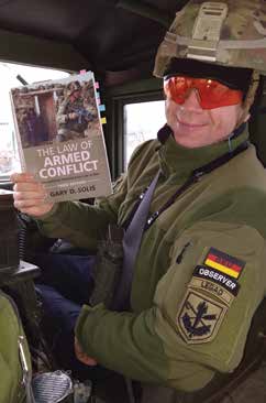  Dr. Jan Ganschow utilized Mr. Gary Solis’s The Law of
    Armed Conflict (Third Edition) during Allied Spirit XIII, a
    Large-Scale Operations Exercise with 6,300 troops
    in Hohenfels, Germany. (Photo courtesy of author)